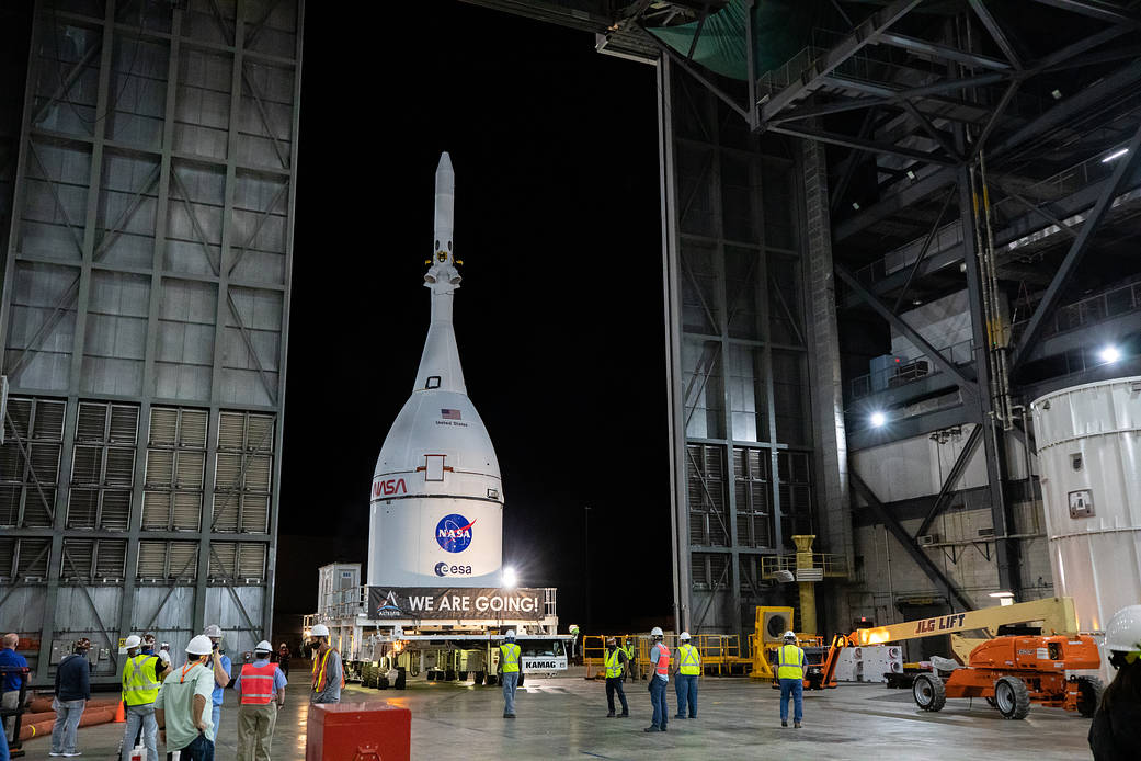 The Orion spacecraft for NASA’s Artemis I mission, fully assembled with its launch abort system, is moved into the transfer aisle of the Vehicle Assembly Building (VAB) at Kennedy Space Center in Florida.
