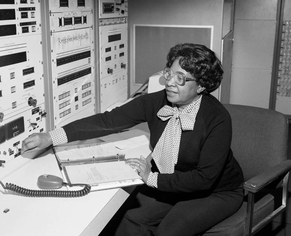 Mary Jackson at desk with computers