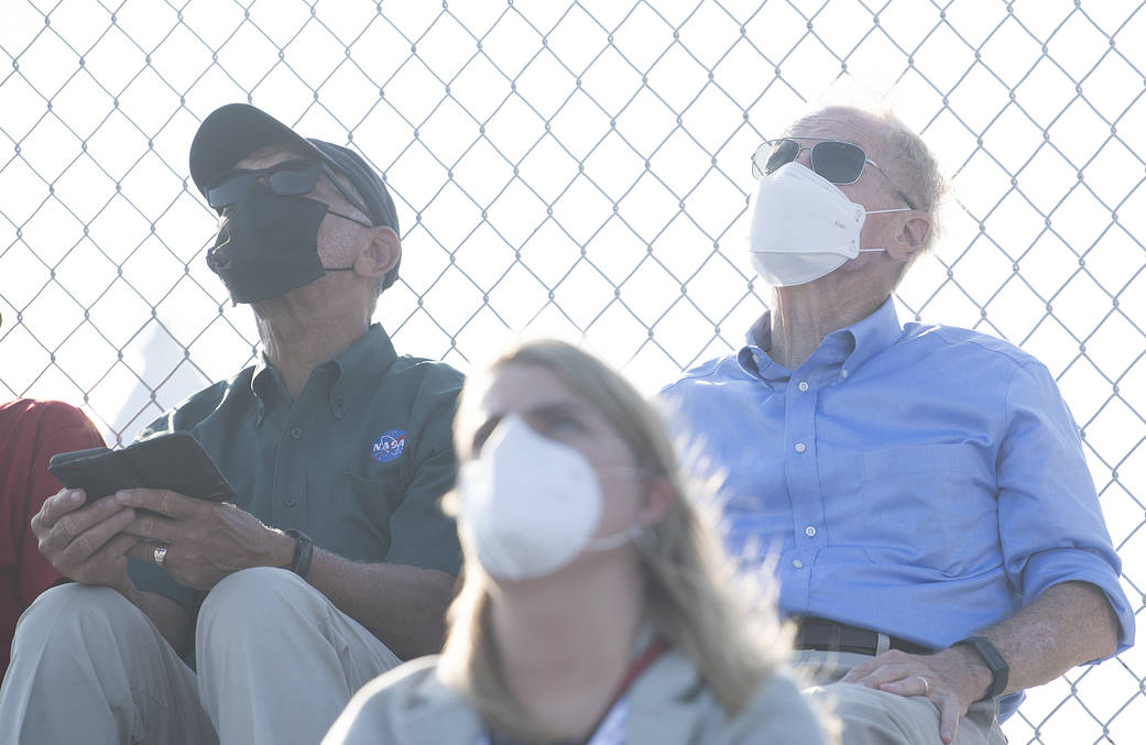 NASA Administrator Bill Nelson, right, and former NASA Administrator Charles Bolden, left, watch as a Northrop Grumman Antares rocket carrying a Cygnus resupply spacecraft launches from the Mid-Atlantic Regional Spaceport, Tuesday, Aug. 10, 2021.