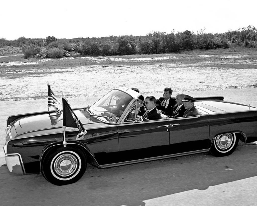 Astronaut John Glenn and President John F. Kennedy in convertible car