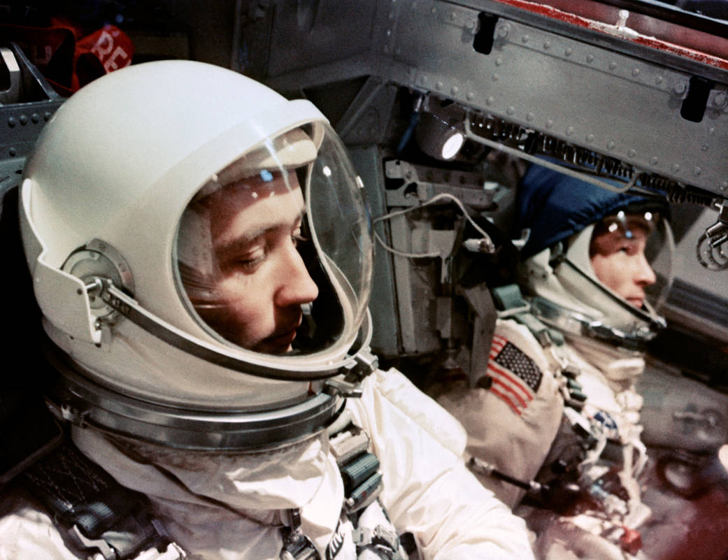 Closeup of two astronauts inside Gemini spacecraft