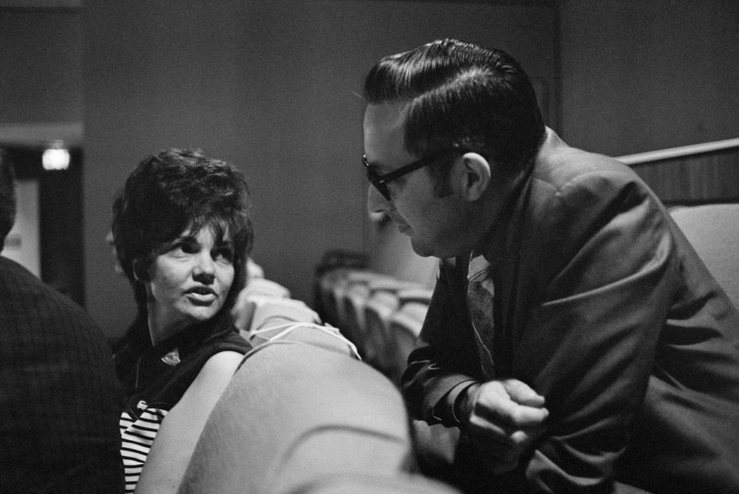 Mrs. Lovell in Viewing Room Overlooking Control Room—April 14, 1970