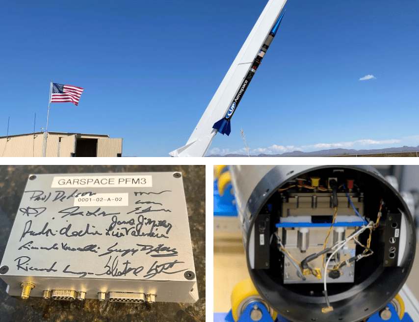 Rocket on slants launcher, square metal box signed by researchers, open end of metal tube housing electronics.