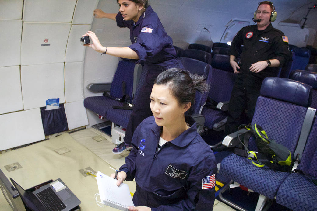 Researchers on the SPECTRE 2 team monitor their experiment.