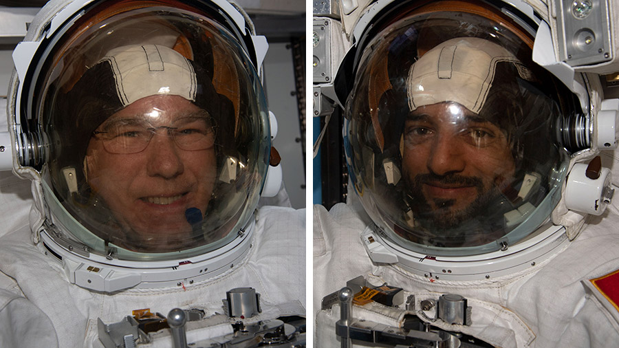 Astronauts (from left) Stephen Bowen and Sultan Alneyadi try on and test out the their spacesuits ahead of a spacewalk planned for Friday, April 28.