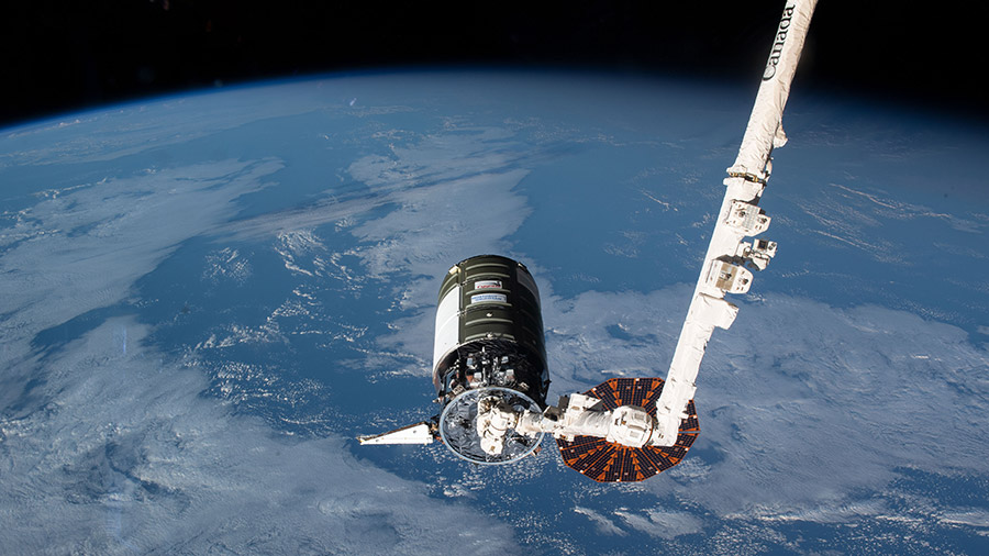 The Cygnus space freighter, loaded with 8,200 pounds of cargo, is pictured in the grips of the Canadarm2 robotic arm before its installation to the Unity module on Nov. 9, 2022.