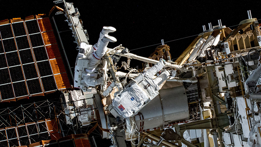 Spacewalkers (from left) Stephen Bowen and Sultan Alneyadi work on the space station's starboard truss structure during a seven-hour and one-minute spacewalk on April 28, 2023.