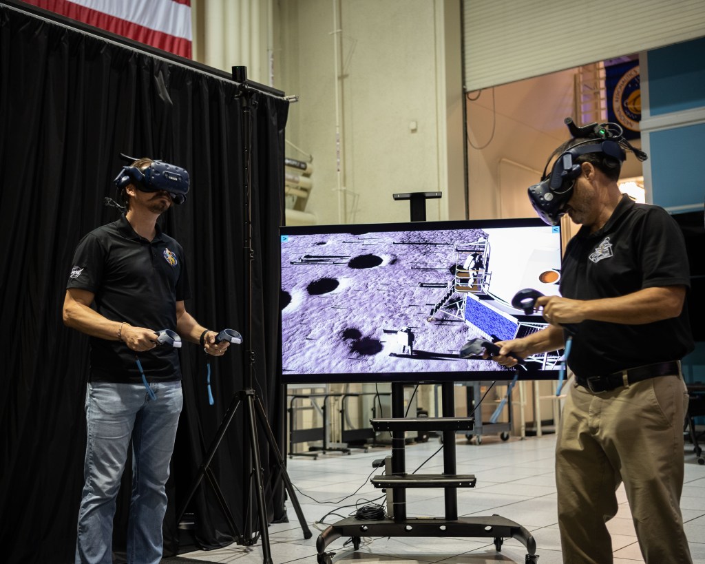 Two men VR equipment in a Lunar Assessment