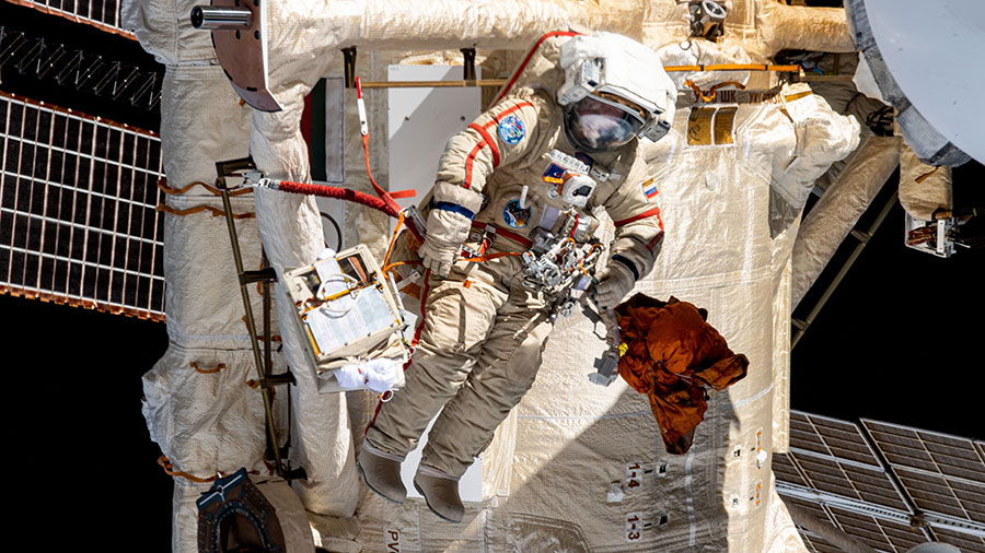 Roscosmos spacewalker Sergey Prokopyev works outside the space station during the installation of an experiment airlock on the Nauka science module on May 3.