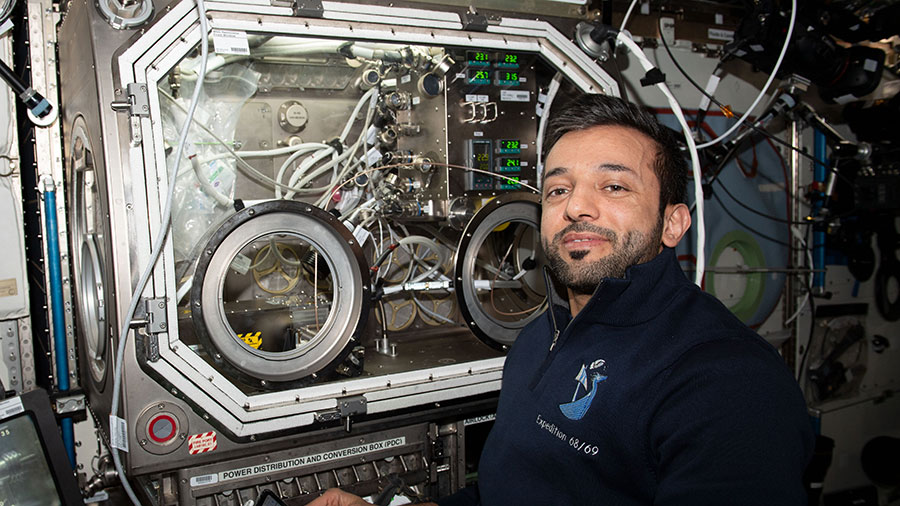 Astronaut Sultan Alneyadi sets up physics research hardware in the Destiny laboratory module's Microgravity Science Glovebox to create a superior graphene aerogel.