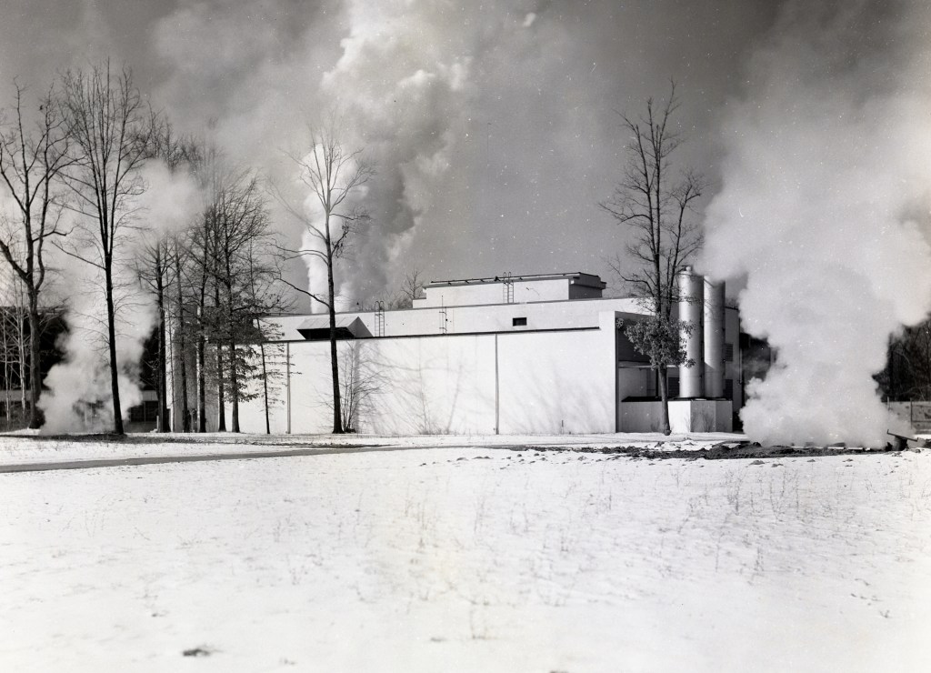 Steam rising from building.