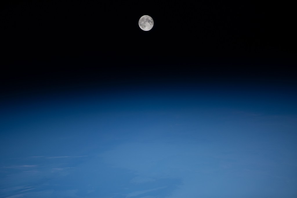 The waning gibbous Moon is pictured above Earth from the International Space Station as it soared into an orbital nighttime 260 miles above the Atlantic Ocean near the northeast coast of South America.