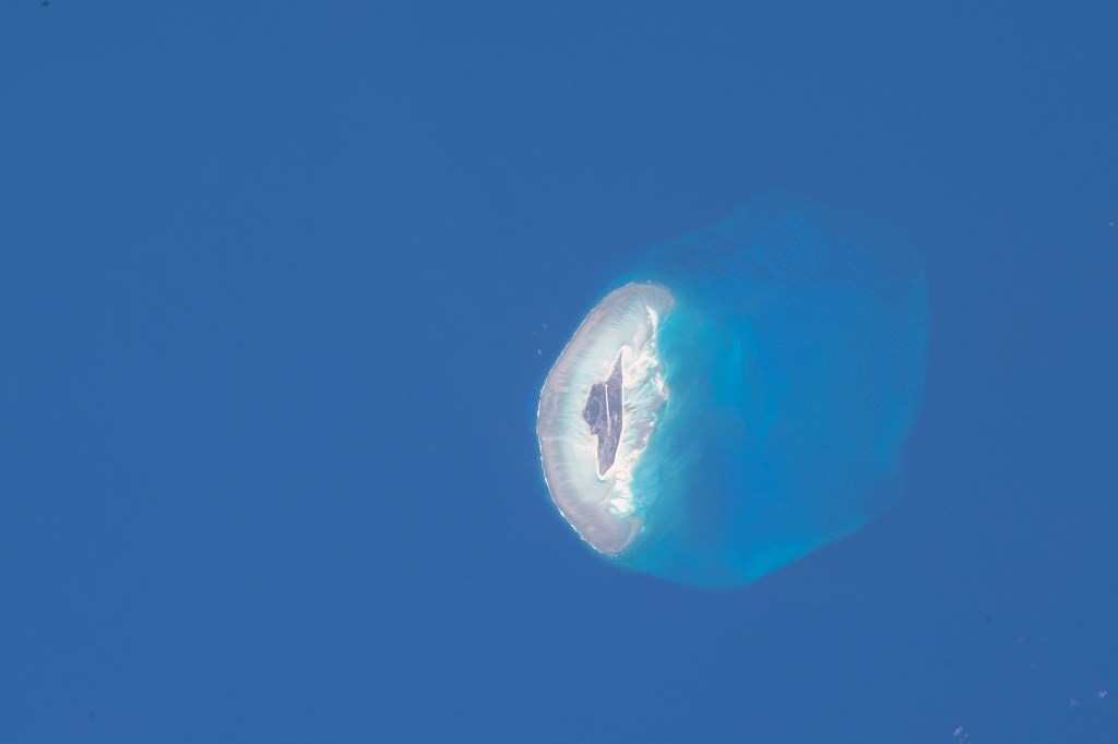 Sitting between Madagascar and Mozambique in the Indian Ocean, the low island of Juan de Nova was photographed from the International Space Station as it soared 260 miles above.