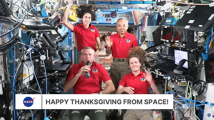 Four Expedition 70 crewmates wish a Happy Thanksgiving from the International Space Station to the Earth below.