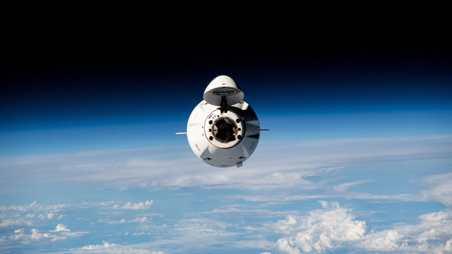 The SpaceX Dragon cargo spacecraft is pictured approaching the space station above the Indian Ocean on March 16, 2023.