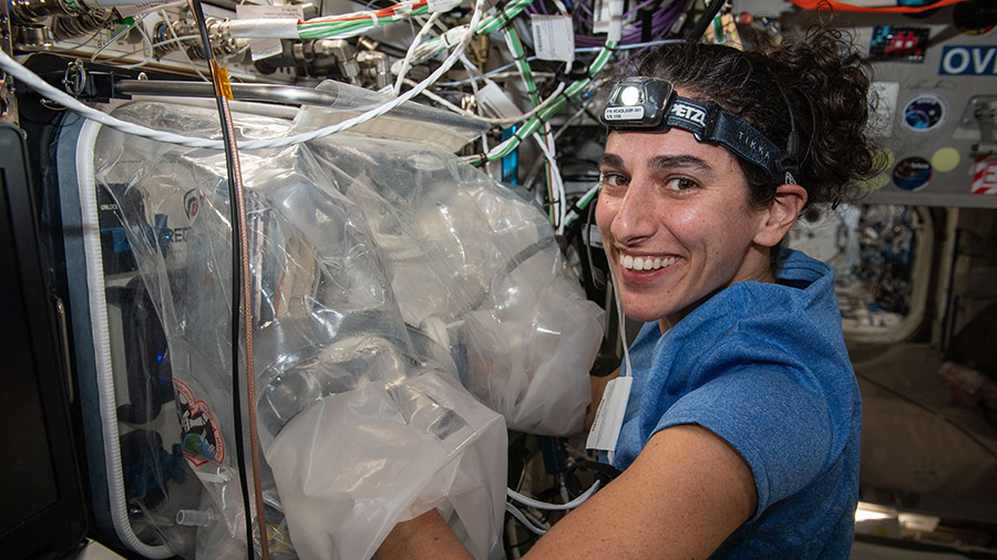 Astronaut Jasmin Moghbeli works on the BioFabrication Facility, a biological printer that is testing the printing of organ-like tissues in microgravity.