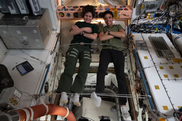 Expedition 67 Flight Engineers (from left) Samantha Cristoforetti from ESA (European Space Agency) and Jessica Watkins of NASA pose together for a fun portrait inside the International Space Station's Harmony module.