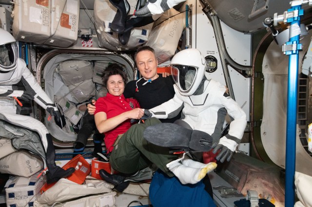 Fellow ESA (European Space Agency) astronauts Samantha Cristoforetti and Matthias Maurer pose for a portrait inside the International Space Station's Harmony module. Maurer would don his SpaceX flight suit later, board the Dragon Endurance crew ship and depart for Earth.