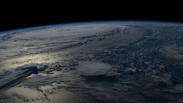 Hurricane Danielle is pictured near the Earth's horizon from the International Space Station as it orbited 261 miles above the northern Atlantic Ocean.