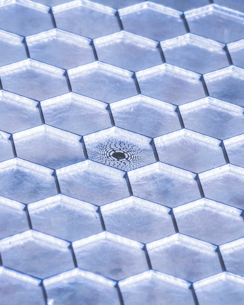 a honeycomb structure holds a photon sieve cut to focus extreme uv light