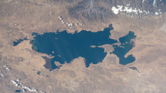 Lake Titicaca, a freshwater lake in the Andes on the border between Bolivia and Peru, is pictured from the International Space Station as it orbited 262 miles above the western portion of the South American continent.