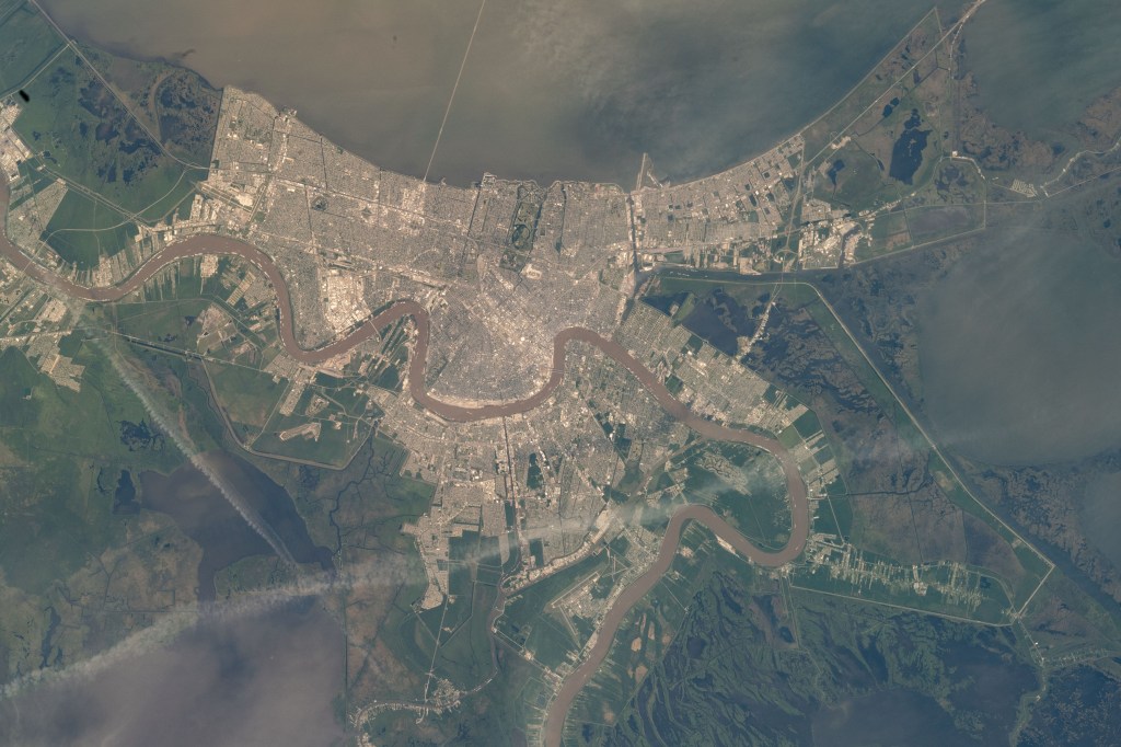 New Orleans, Louisiana, and its surrrounding suburbs, including Gretna, Metarie, and Kenner, are pictured along the Mississsippi River with Lake Ponchartrain at top. The International Space Station was just off the southeast coast of the Pelican State orbiting 264 miles above the Gulf of Mexico at the time of this photograph.