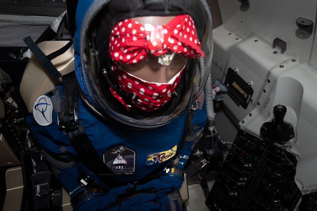 Rosie the Rocketeer, Boeing's anthropometric test device, is pictured in the commander's seat of the company's CST-100 Starliner crew ship for the Orbital Flight Test-2 mission at the International Space Station.