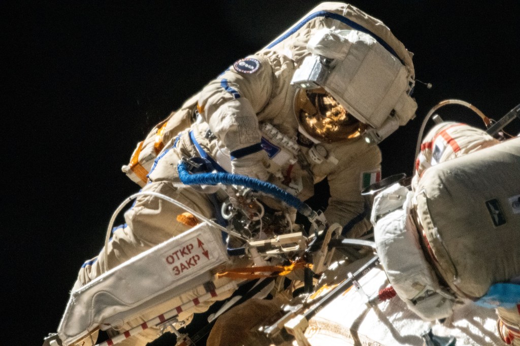 Spacewalker Samantha Cristoforetti of ESA (European Space Agency) works outside the Nauka multipurpose laboratory module on the International Space Station while wearing a Russian Orlan spacesuit. She continued the outfitting of the European robotic arm attached to Nauka during the spacewalk that lasted seven hours and five minutes.