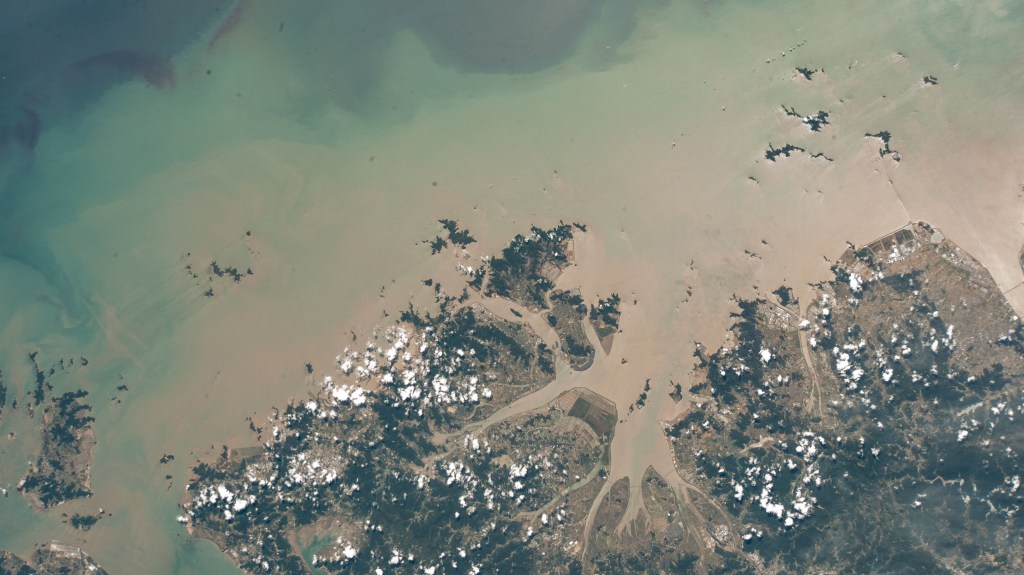 Taizhuo, China, and its surrounding suburbs on the East China Sea are pictured from the International Space Station as it orbited 258 miles above the east coast of the Asian nation.