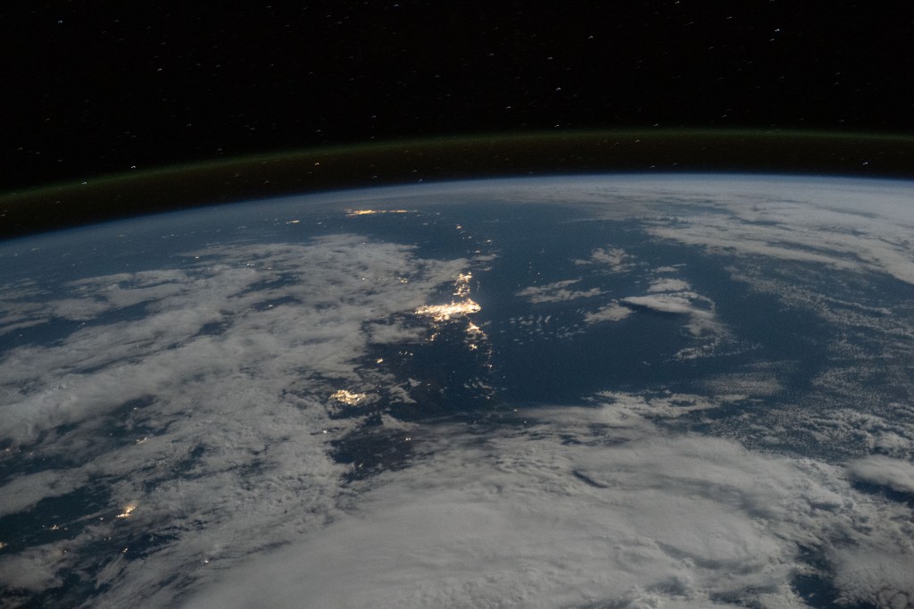 The city lights along Australia's southeast coast, including (from top to bottom) Brisbane, Sydney, and Canberra, are pictured underneath a faint atmospheric glow as the International Space Station orbited 269 miles above the nation's island state of Tasmania.