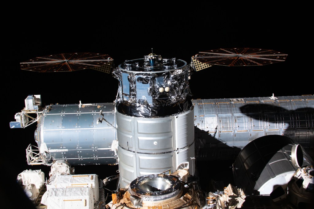 This unique orientation of the Northrop Grumman Cygnus space freighter attached to the Unity module is pictured from the Russian segment of the International Space Station. At lower center, in front of Cygnus is the Rassvet module's docking port. Behind Cygnus, at left, is the Columbus laboratory module, and at right, is the Kibo laboratory module. In front of Kibo, is the Leonardo Permanent Multipurpose Module.