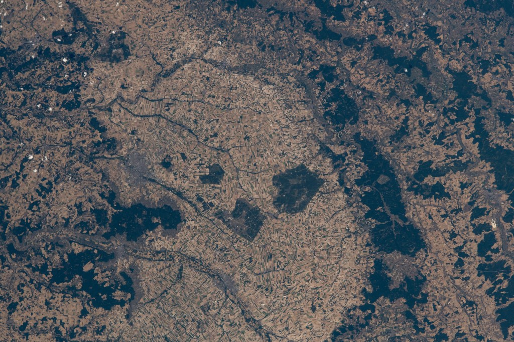 The Grand Est region of northeastern France, including the city of Reims (center left) and notable for its Champagne-producing vineyards, is pictured from the International Space Station as it orbited 260 miles above the European nation.