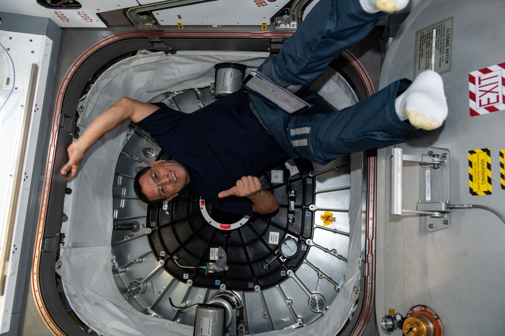 iss068e017315 (Oct. 17, 2022) --- NASA astronaut and Expedition 68 Flight Engineer Frank Rubio poses in front of BEAM, the Bigelow Expandable Activity Module, during cargo activities aboard the International Space Station.