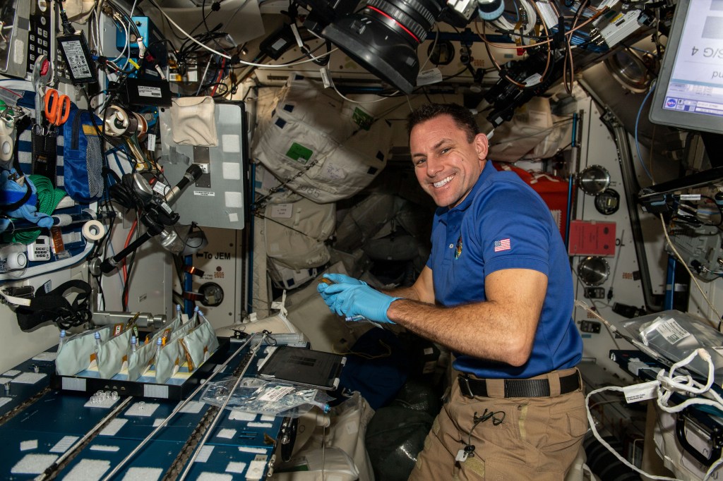 iss068e036904 (Jan. 4, 2022) --- NASA astronaut and Expedition 68 Flight Engineer Josh Cassada works in the International Space Station's Harmony module on the BioNutrients-2 investigation that uses genetically engineered microbes to provide nutrients, and potentially other compounds and pharmaceuticals, on demand in space.