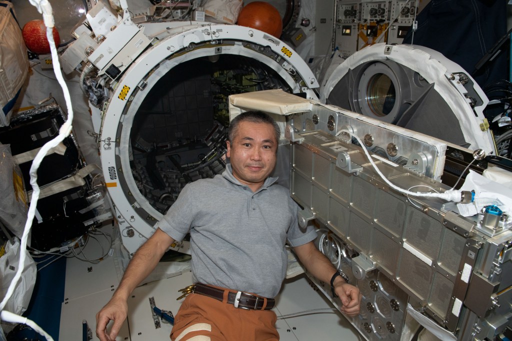 iss068e022682 (Nov. 16, 2023) --- Expedition 68 Flight Engineer Koichi Wakata of the Japan Aerospace Exploration Agency (JAXA) works on a small satellite orbital deployer before placing it inside the Kibo laboratory module's airlock where it would later be placed into the vacuum of space.