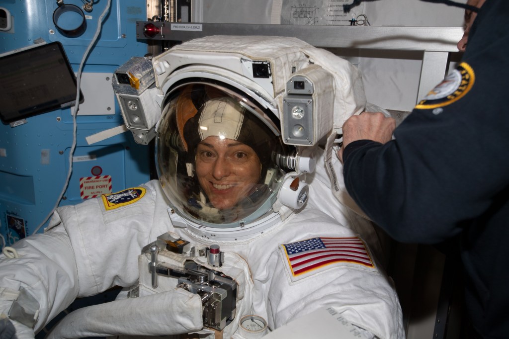 iss068e041391 (Jan. 20, 2022) --- NASA astronaut and Expedition 68 Flight Engineer Nicole Mann is pictured in her Extravehicular Mobility Unit (EMU), or spacesuit, after finishing a seven-hour and 21-minute spacewalk installing a modification kit on the International Space Station's starboard truss structure preparing the orbital lab for its next roll-out solar array.
