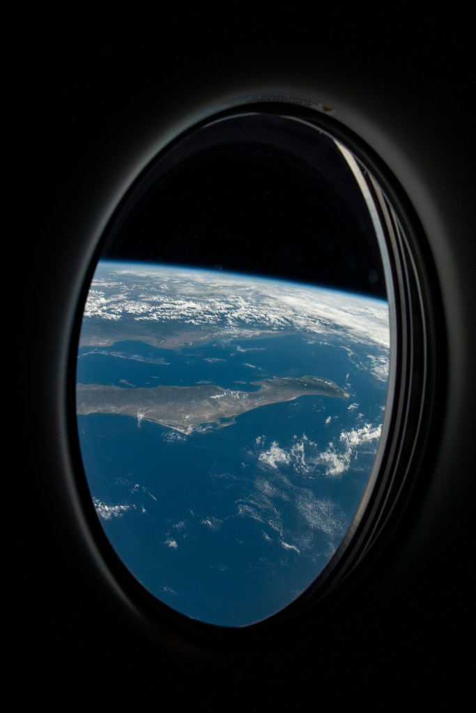 iss068e012233 (Oct. 5, 2022) --- This view from a window on the SpaceX Dragon Freedom crew ship looks out at Baja California Sur and the Gulf of California as the International Space Station orbited 261 miles above the Pacific Ocean.
