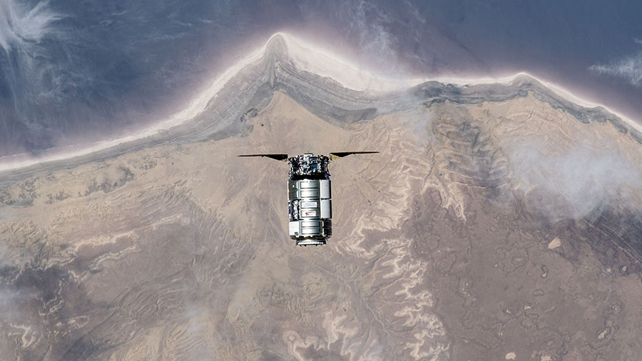 The Cygnus cargo craft approaches the International Space Station on Aug. 4 while orbiting 261 miles above the coast of the Garabogazköl Basin in Turkmenistan.