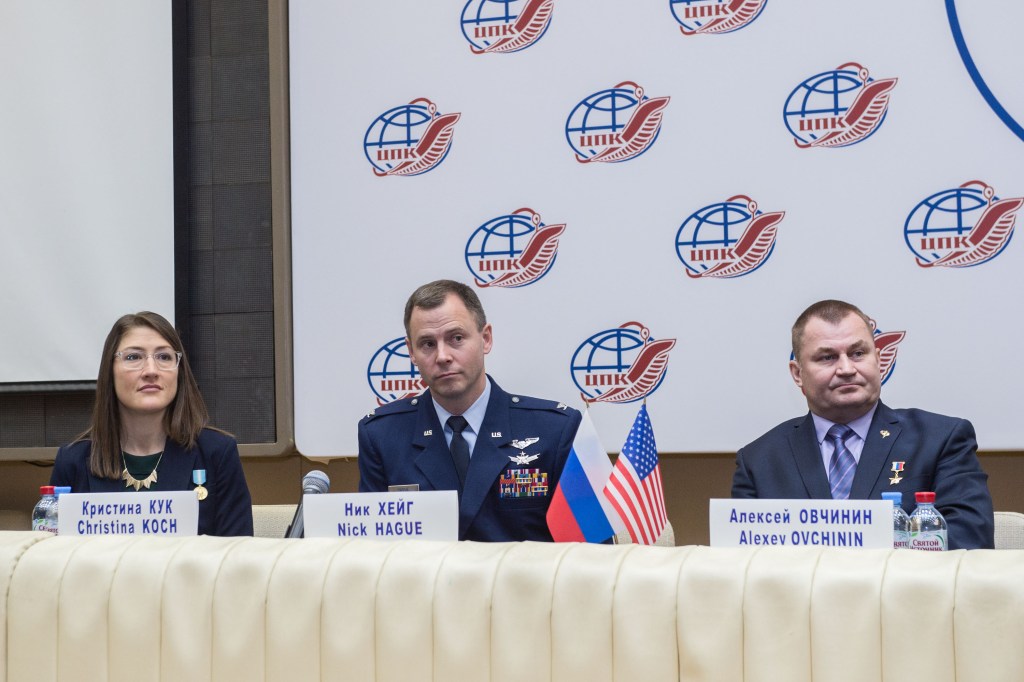 At the Gagarin Cosmonaut Training Center in Star City, Russia, Expedition 59 crew members Christina Koch of NASA (left), Nick Hague of NASA (center) and Alexey Ovchinin of Roscosmos (right) listen to reporters’ questions Feb. 21 during a pre-launch news conference. They will launch March 14, U.S. time, on the Soyuz MS-12 spacecraft from the Baikonur Cosmodrome in Kazakhstan for a six-and-a-half month mission on the International Space Station.