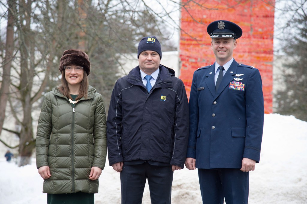 At the Gagarin Cosmonaut Training Center in Star City, Russia, Expedition 59 crew members Christina Koch of NASA (left), Alexey Ovchinin of Roscosmos (center) and Nick Hague of NASA (right) pose for pictures Feb. 26 as they prepared to depart for their launch site at the Baikonur Cosmodrome in Kazakhstan for final pre-launch training. They will launch on March 14, U.S. time, on the Soyuz MS-12 spacecraft from the Baikonur Cosmodrome in Kazakhstan for a six-and-a-half month mission on the International Space Station.