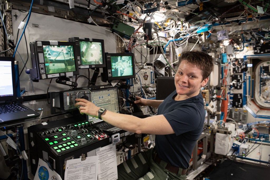 Expedition 59 Flight Engineer Anne McClain of NASA uses the robotics workstation inside the U.S. Destiny laboratory module to practice Canadarm2 robotics maneuvers and Cygnus spacecraft capture techniques.