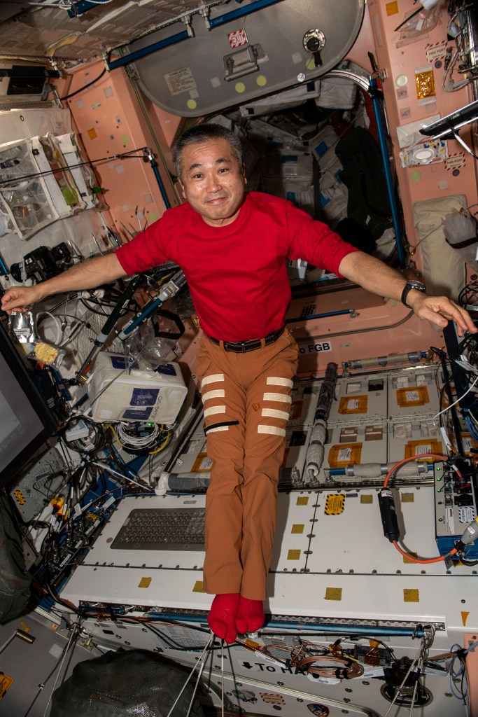 iss068e023651 (Nov. 23, 2022) --- Expedition 68 Flight Engineer Koichi Wakata of the Japan Aerospace Exploration Agency (JAXA) poses for a portrait aboard the International Space Station's Harmony module.