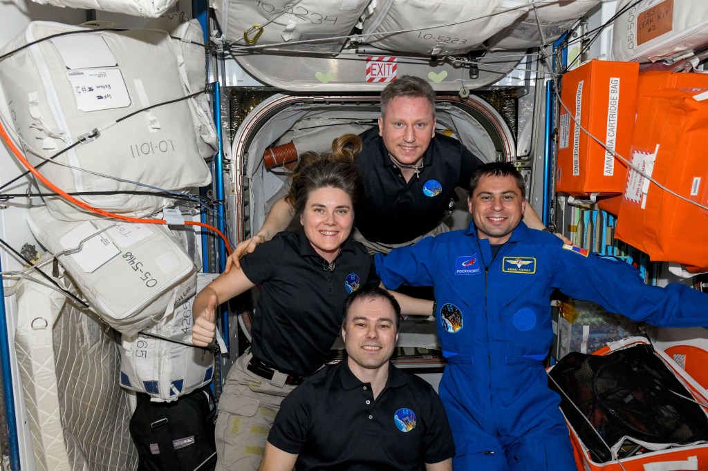 iss068e067571 (March 3, 2023) ---Clockwise from top, are Expedition 68 Commander Sergey Prokopyev with Flight Engineers Andrey Fedyaev, Dmitri Petelin, and Anna Kikina, all from Roscosmos.