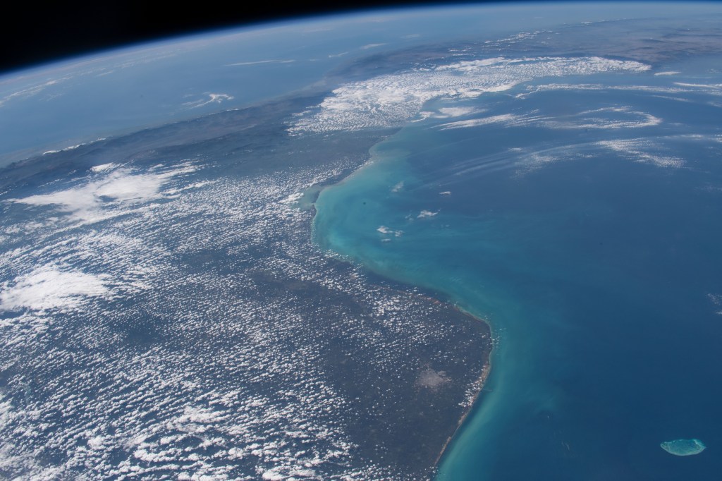 iss068e043709 (Jan. 29, 2023) --- Mexico's Yucatan Peninsula and Isla Pérez (lower right) are pictured from the International Space Station as it orbited 259 miles above the Gulf of Mexico.