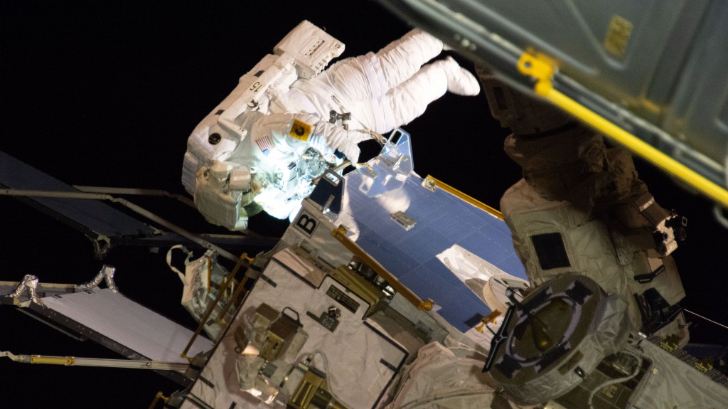 NASA astronaut Christina Koch participates in her first spacewalk to upgrade the International Space Station's power storage capacity. She and fellow spacewalker Nick Hague (out of frame) of NASA worked outside in the vacuum of space for six hours and 45 minutes to continue swapping batteries and install adapter plates on the station's Port-4 truss structure.