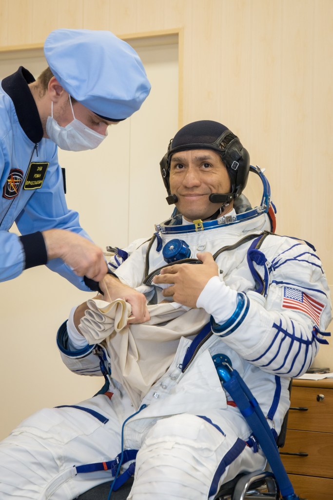 jsc2022e072269 (Sept. 7, 2022) --- At the Baikonur Cosmodrome in Kazakhstan, NASA astronaut Frank Rubio undergoes preflight spacesuit fit checkouts. Rubio is scheduled to launch with crewmates Roscosmos cosmonaut Sergey Prokopyev and Dmitri Petelin Sept. 21 for a six-month mission on the International Space Station. Credit: NASA/Victor Zelentsov.
