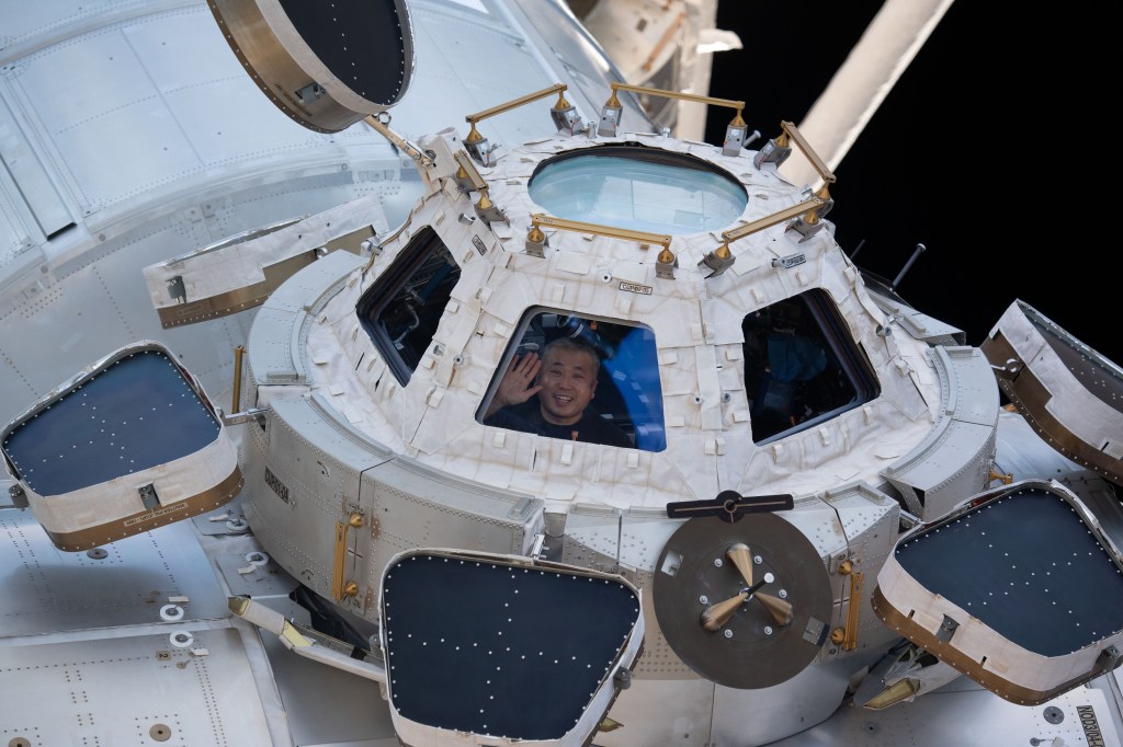 iss068e036079 (Jan. 2, 2023) --- Expedition 68 Flight Engineer Koichi Wakata of the Japan Aerospace Exploration (JAXA) peers through one of the seven windows in the cupola, the International Space Station's "window to the world."