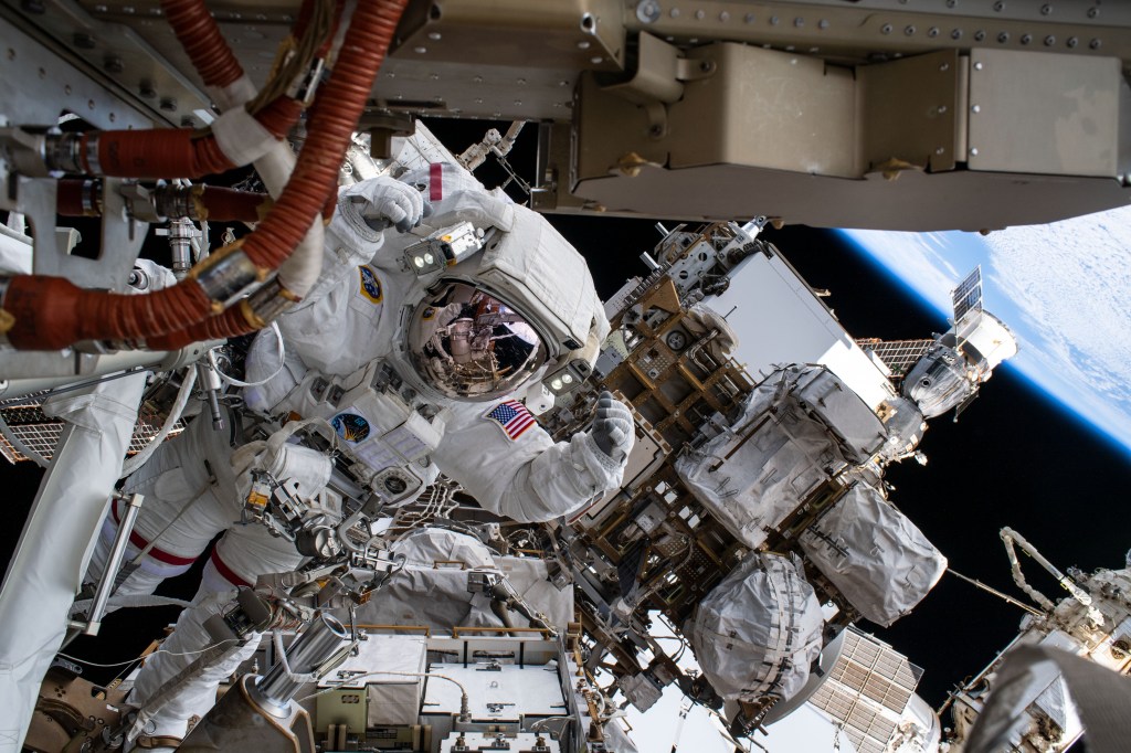 iss068e045203 (Feb. 2, 2023) --- NASA astronaut and Expedition 68 Flight Engineer Nicole Mann is pictured in her Extravehicular Mobility Unit, or spacesuit, during her second spacewalk. She and fellow spacewalker Koichi Wakata (out of frame) of the Japan Aerospace Exploration Agency (JAXA) installed a modification kit on the International Space Station's starboard truss structure that will enable the future installation of the orbiting lab's next roll-out solar array.