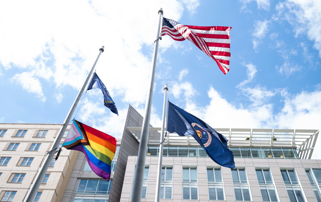 The Progress Pride flag is seen flying at the Mary W. Jackson NASA Headquarters Building, Thursday, June 9, 2022, in Washington, DC. In recognition of LGBTQ+ Pride Month, the Progress Pride flag will be flown outside of the agency’s headquarters for the month of June. Photo Credit: (NASA/Joel Kowsky)