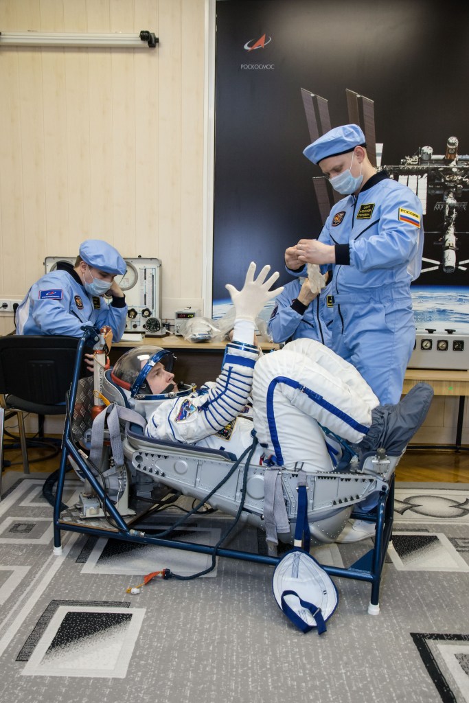 At the Baikonur Cosmodrome in Kazakhstan, Expedition 59 crew member Nick Hague of NASA undergoes a Sokol launch suit pressure check Feb. 27 during pre-launch training. Hague, Christina Koch of NASA and Alexey Ovchinin of Roscosmos will launch March 14, U.S. time, on the Soyuz MS-12 spacecraft from the Baikonur Cosmodrome in Kazakhstan for a six-and-a-half month mission on the International Space Station.